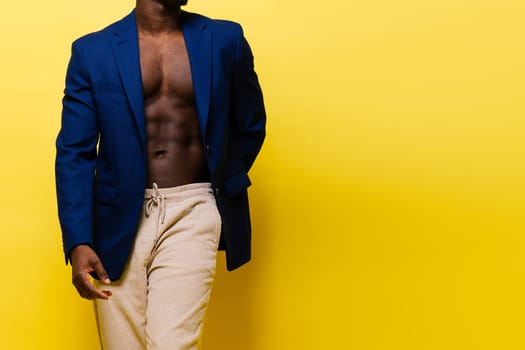 Happy african american young businessman in a formal suit portrait. Confident black guy posing