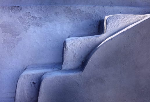 Narrow stone steps, a traditional piece of architecture on the island of Santorini. Greece