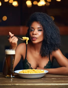 gorgeous young woman eating macaroni cheese and drinking beer, AI generated image