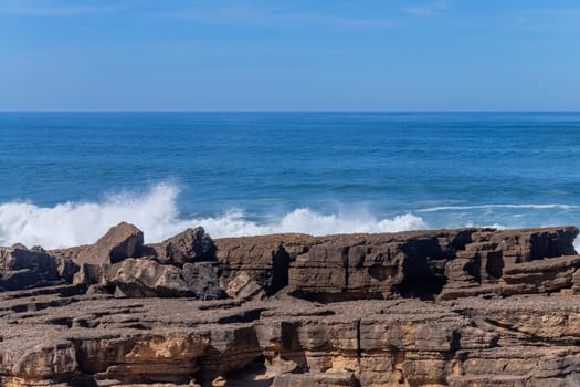 View of ocean waves and fantastic rocky coast in Ericeira, near Lisbon. Portugal