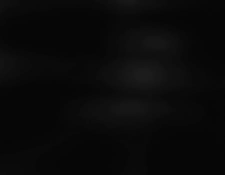 Graceful, swirling curves emerging from a dark backdrop, emphasizing fluidity and a dynamic sense of movement, inviting contemplation. Black background with smooth lines. Generative AI.