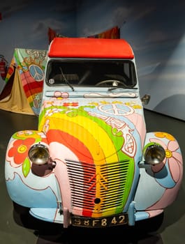 Turin, Italy - 11 november 2023: Car Museum. Citroen 2 CV, 1958. Vintage icon of hippies travel, adventure, peace.