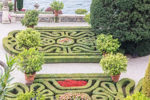 Isola Bella, Italy - 1 August 2023: baroque Italian garden on Lake Maggiore. Scenic landscape view.