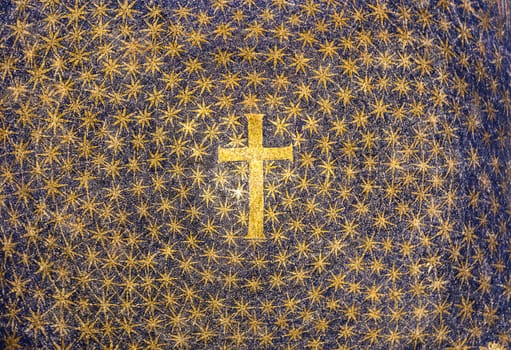 Old cross made of mosaic in Italian Byzantine church. Religion spiritual icon