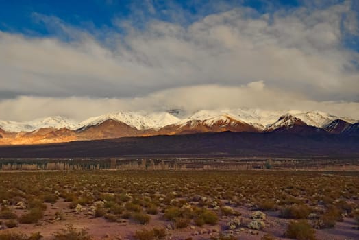 Snow-covered Andes mountains at dawn near Uspallata, Argentina.