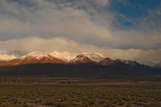 Snow-covered Andes mountains at dawn near Uspallata, Argentina.