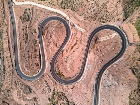 Twisty mountain road across the the Andes mountains near Potrerillos, Argentina. Aerial view.