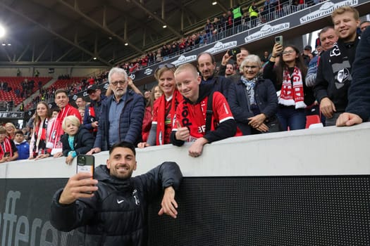 After the game,the scorer of the 1-0,Vincenzo Grifo (SC Freiburg) has himself photographed with a few friends and fans taking a selfie after the game of the 1st FBL: 24-25: 1st FBL: 24-25: 7th Sptg. SC Freiburg - FC Augsburg  DFL REGULATIONS PROHIBIT ANY USE OF PHOTOGRAPHS AS IMAGE SEQUENCES AND/OR QUASI-VIDEONann  Photo: Joachim Hahne/johapress