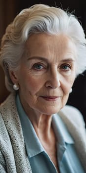Sophisticated older French woman sits contemplatively in a softly lit room. Demeanor reveals a lifetime of experiences and reflections, embodying grace and wisdom. Well-groomed woman 70 years old. AI.