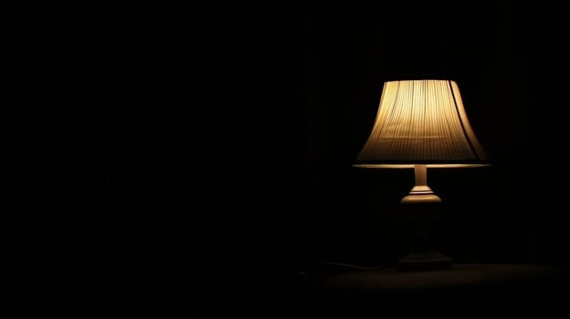 A minimalist image featuring a completely dark black background, illuminated only by a solitary light from a lamp. The striking contrast between light and shadow creates a dramatic and contemplative atmosphere, evoking feelings of solitude, focus, and serenity.