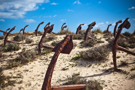 Cemetery of the old anchors, Portugal ocean coast. Horizontal shot