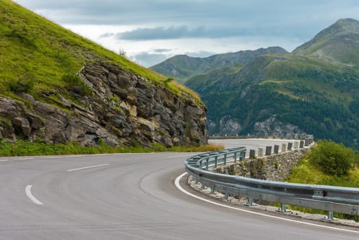Road Turn in Swiss Mountains. Small GRIP shot