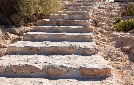 stone staircase on dry ground. horizontal shot