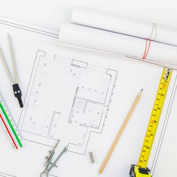 Creative flat lay overhead top view blueprints architectural flat project plan and office supplies on decorator square white table workspace swatches tools and equipment background copy space concept