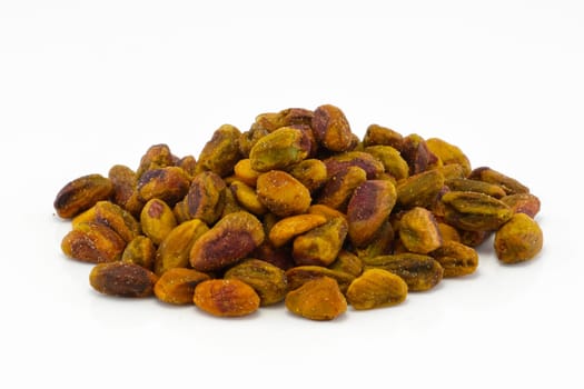 A pistachio nuts group isolated on white