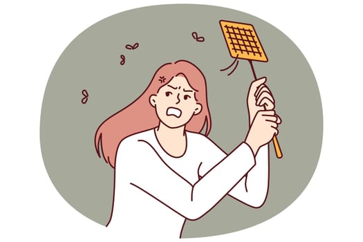 Angry woman kills mosquitoes using swatter feeling irritated due to insects disturbing sleep on summer night. Girl with swatter is annoyed by camaras and maskites and needs electric fumigator
