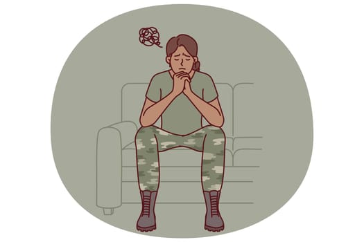 Woman soldier suffers from ptsd caused by bad memories after participating in combat operations. Girl in military uniform of soldier sits on sofa in need of help from army psychologist for veterans