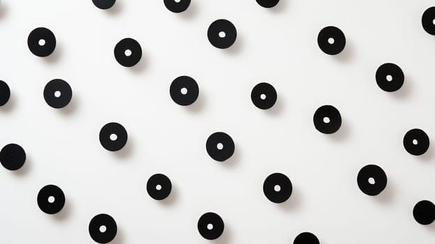 A simple and elegant design featuring a white quotation mark centered within a field of black dots. The minimalistic layout utilizes whitespace and negative space to emphasize the quote, creating a clean and modern aesthetic.