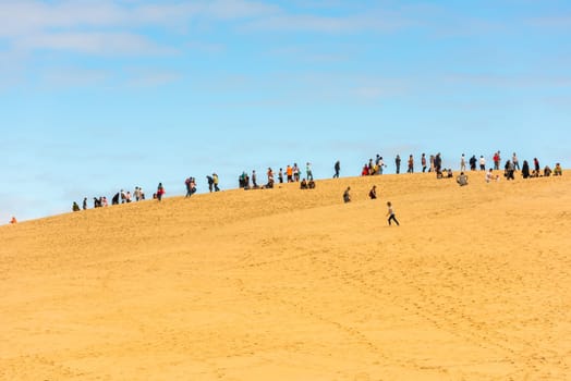 FRANCE, LA TESTE-DE-BUCH - SEPTEMBER 19: people visiting the famous highest sand dune in Europe Dune of Pyla on September 19, 2015