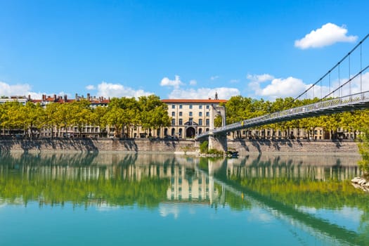 Cityscape of Lyon, France with reflections in the water. Summer day