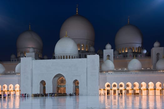 View of famous Sheikh Zayed White Mosque in Abu Dhabi, UAE at night