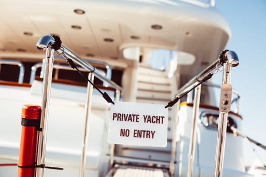 Bridge of private luxury ship with prohibited entry sign Private yacht No entry in Marina of Cannes, French Riviera, France