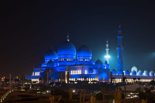 View of famous Sheikh Zayed White Mosque in Abu Dhabi, UAE at night