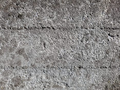 grey concrete wall texture useful as a background