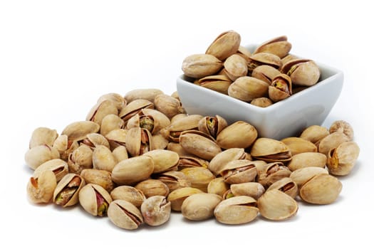 A pistachio nuts in shells group