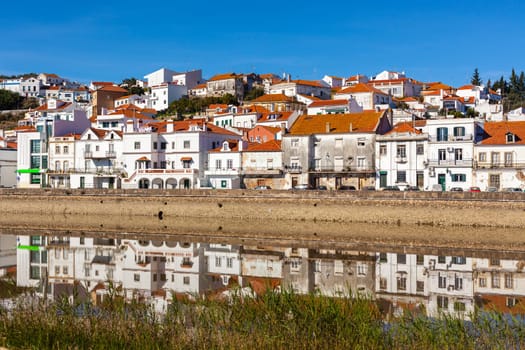 View of city Alcacer do Sal near the river Sado in Portugal. Horizontal shot
