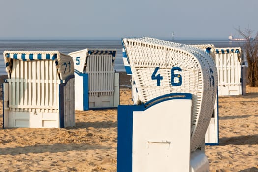 BeachÊwickerÊchairs strandkorbÊin Northern Germany. North sea