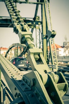 Metal structure elevation bridge over Sado river. Alcacer do Sal, Portugal. Filtered shot