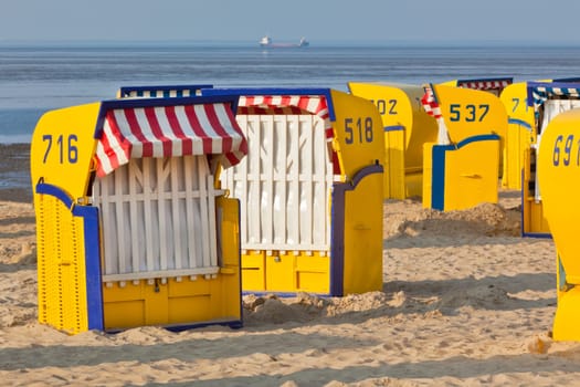 Beach wicker chairs strandkorb in Northern Germany. North sea
