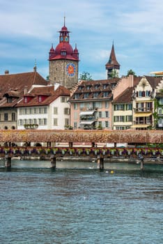 SWITZERLAND, LUZERN - AUGUST 23: view of historic Luzern city center with river Reuss and The Chapel bridge on August 23, 2015
