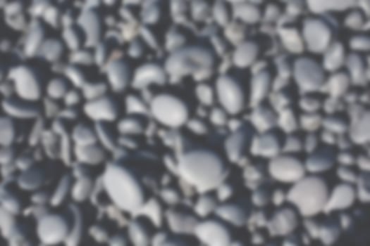 Icelandic Beach Pebbles Background. Horizontal defocused blur shot