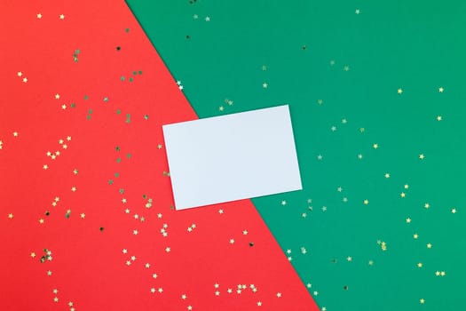Creative New Year or Christmas greetings letter mockup flat lay top view Xmas holiday celebration envelope on red green paper background. Template mock up greeting card or your text design 2019 2020