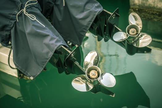two motor boat screws horizontal day shot