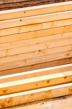 Construction of new wooden house. Beams frame close up