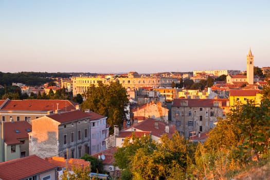 View of Pula, Croatia cityscape at sunset from above