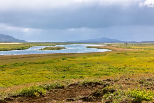 Lake in Pingvellir national park, Iceland. Overcast weather