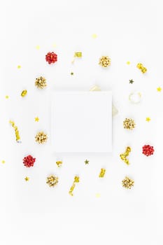 Christmas composition. New Year or Christmas pattern flat lay top view Xmas holiday celebration decorative golden square frame mockup on white background with copy space. Template of greeting card