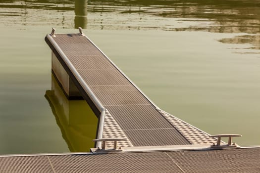 Modern Pier in the water. Shot with a selective focus