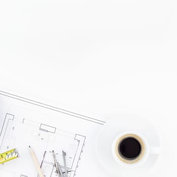 Creative flat lay overhead top view blueprint flat project plan hot coffee cup alarm clock and office supplies on decorator table workspace swatches tools and equipment background copy space concept