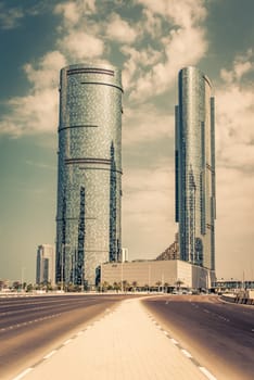 ABU DHABI, UAE - DECEMBER 24: Abu Dhabi streets with skyscrapers on December 24, 2014. United Arab Emirates