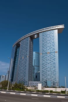 ABU DHABI, UAE - DECEMBER 24: Abu Dhabi streets with The Gate Towers skyscrapers on December 24, 2014. United Arab Emirates