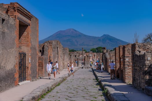 Pompeii, Italy - August 8, 2024: Ruins of a city. Pompeii is an ancient Roman city died from the eruption of Mount Vesuvius in 79 AD.