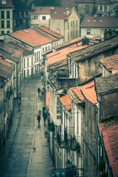 Looking down onto the Rainy Street of Old Town Santiago de Compostela, Spain