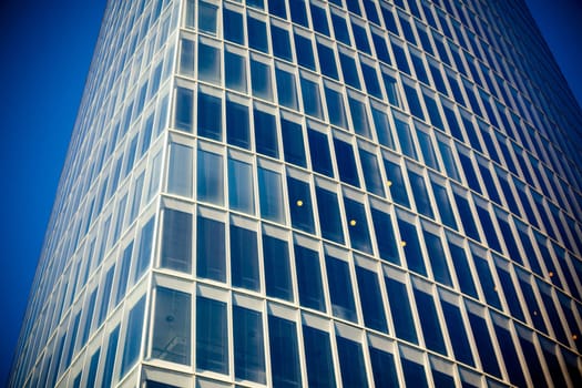 Office glass skyscraper building. Horizontal filtered shot