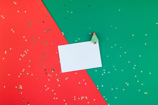 Creative New Year or Christmas greetings letter mockup flat lay top view Xmas holiday celebration envelope on red green paper background. Template mock up greeting card or your text design 2019 2020