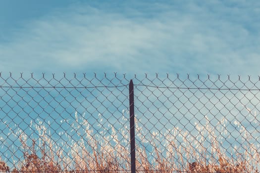 Razor and barbed wire fence. Forbidden place